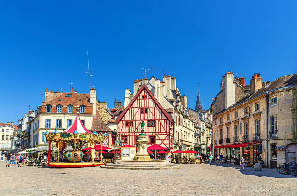 Place François-Rude in Dijon, half-timbered house and carousel in the heart of the old town